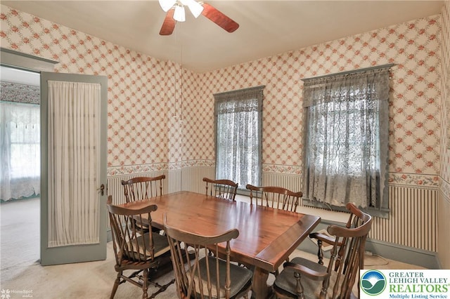 171 N New St, Nazareth Borough, PA 18064 - carpeted dining space featuring a ceiling fan, a wainscoted wall, and wallpapered walls
