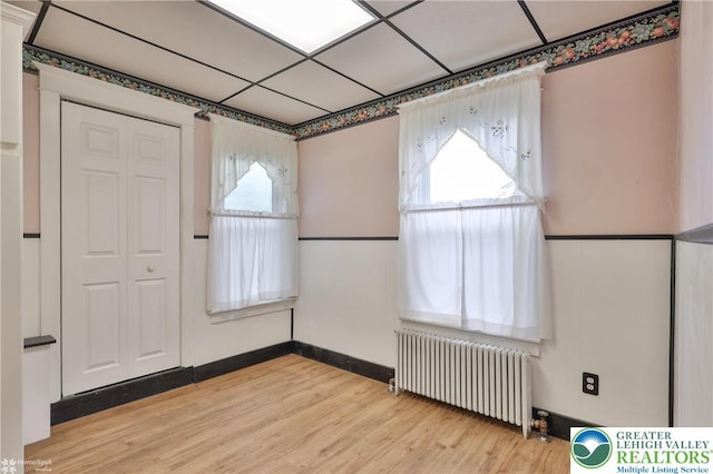 171 N New St, Nazareth Borough, PA 18064 - spare room with radiator heating unit, healthy amount of natural light, light wood finished floors, and baseboards