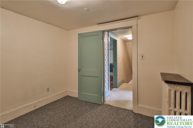 171 N New St, Nazareth Borough, PA 18064 - unfurnished bedroom featuring dark colored carpet and baseboards
