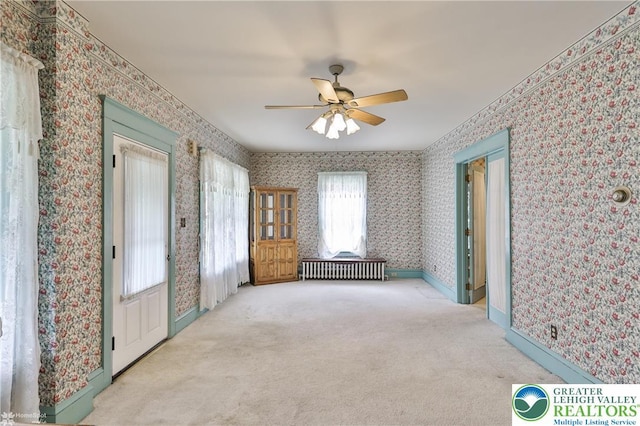 171 N New St, Nazareth Borough, PA 18064 - spare room featuring ceiling fan, wallpapered walls, and carpet floors