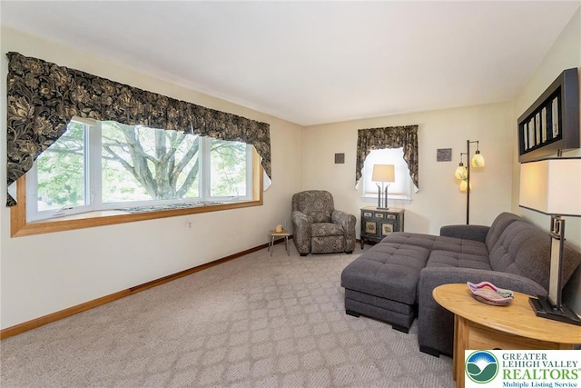 217 26th St, Allentown City, PA 18104 - living area featuring plenty of natural light, light colored carpet, and baseboards