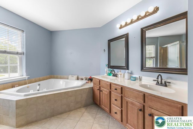 140 Birdie Way, Eldred Twp, PA 18058 - full bath with double vanity, a tub with jets, tile patterned flooring, and a shower with shower door