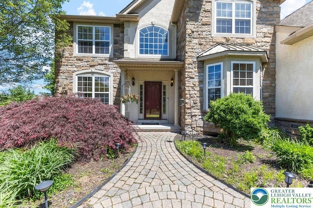 140 Birdie Way, Eldred Twp, PA 18058 - doorway to property featuring stone siding and stucco siding