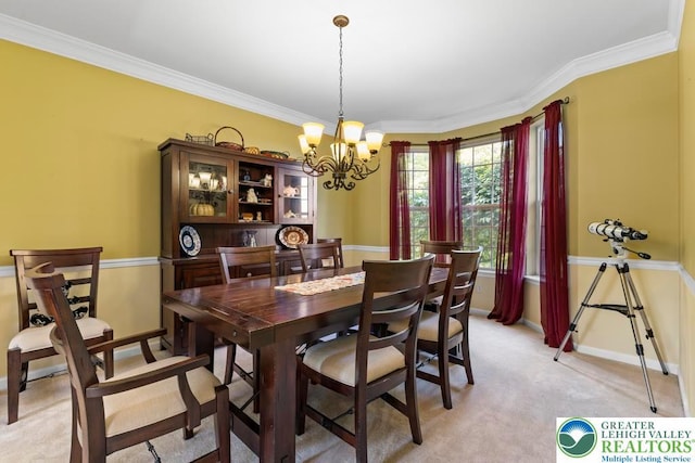 140 Birdie Way, Eldred Twp, PA 18058 - dining area featuring a chandelier, baseboards, crown molding, and light carpet