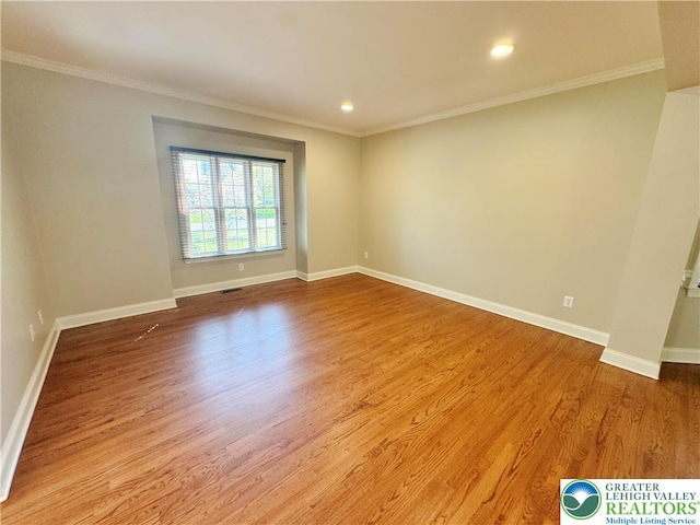 4620 Graystone Dr, Lower Nazareth Twp, PA 18064 - empty room with crown molding, wood finished floors, and recessed lighting