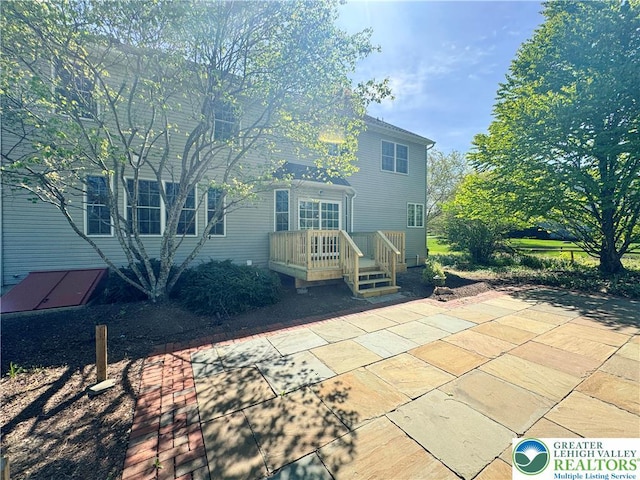 4620 Graystone Dr, Lower Nazareth Twp, PA 18064 - back of property with a patio area