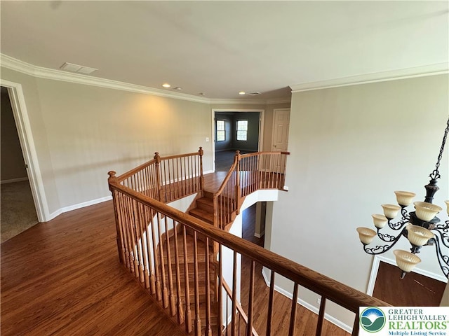 4620 Graystone Dr, Lower Nazareth Twp, PA 18064 - corridor with an upstairs landing, crown molding, wood finished floors, a chandelier, and recessed lighting