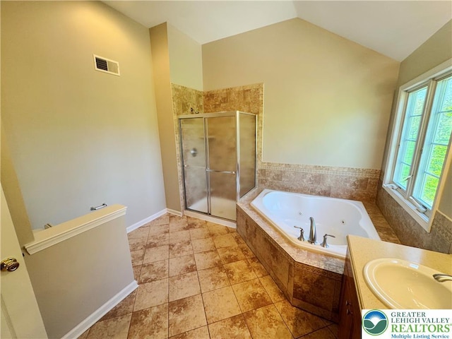 4620 Graystone Dr, Lower Nazareth Twp, PA 18064 - bathroom with a shower stall, a jetted tub, lofted ceiling, and vanity
