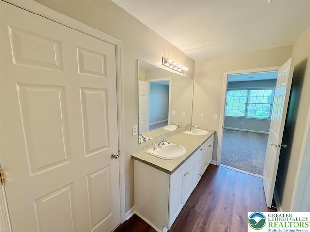 4620 Graystone Dr, Lower Nazareth Twp, PA 18064 - full bath featuring double vanity and wood finished floors
