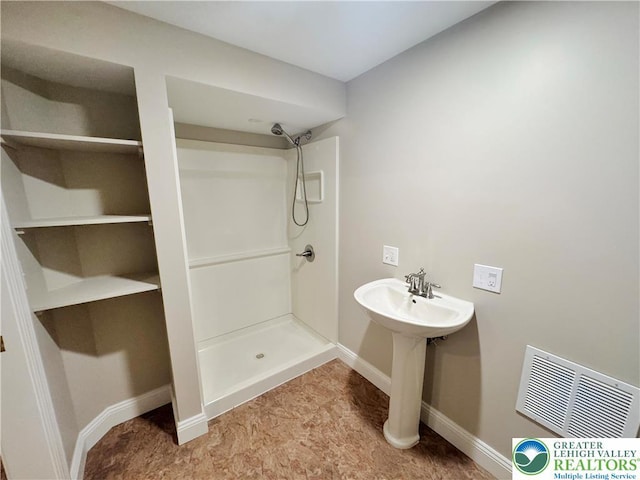 4620 Graystone Dr, Lower Nazareth Twp, PA 18064 - bathroom with a stall shower and baseboards