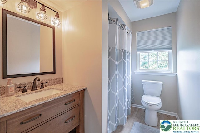 3624 Mcintosh Dr, North Whitehall Twp, PA 18069 - full bath featuring vanity, toilet, baseboards, and a shower with shower curtain