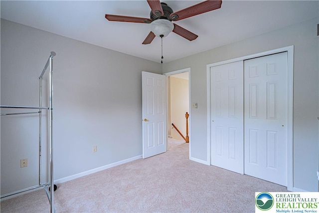 3624 Mcintosh Dr, North Whitehall Twp, PA 18069 - unfurnished bedroom with carpet floors, a closet, baseboards, and a ceiling fan