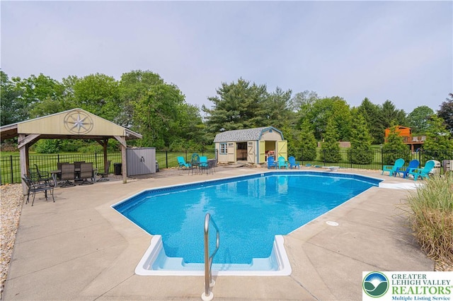 3624 Mcintosh Dr, North Whitehall Twp, PA 18069 - view of swimming pool with a gazebo, a patio area, and view of wooded area