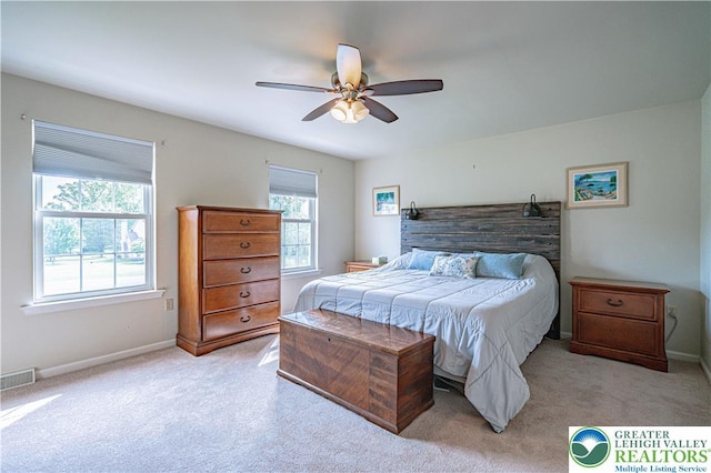 3624 Mcintosh Dr, North Whitehall Twp, PA 18069 - bedroom with light carpet, baseboards, and a ceiling fan