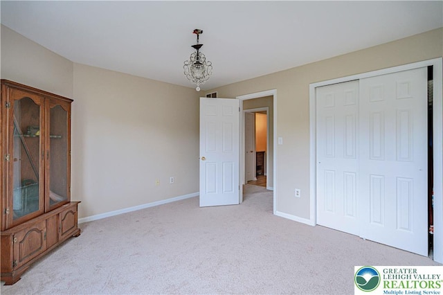 3624 Mcintosh Dr, North Whitehall Twp, PA 18069 - unfurnished bedroom featuring light carpet, baseboards, and a closet