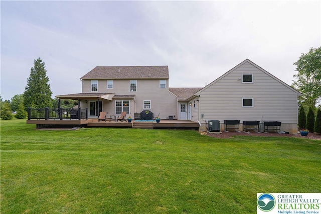 3624 Mcintosh Dr, North Whitehall Twp, PA 18069 - back of house featuring central AC, a yard, and a wooden deck