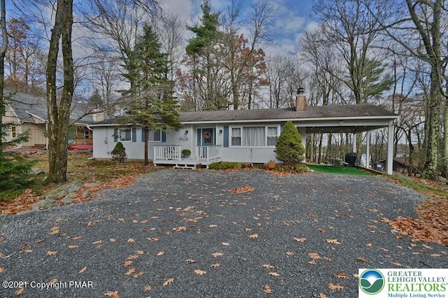 36 Maplewood Rd, Kidder Township S, PA 18624 - ranch-style home with a chimney, driveway, and a carport