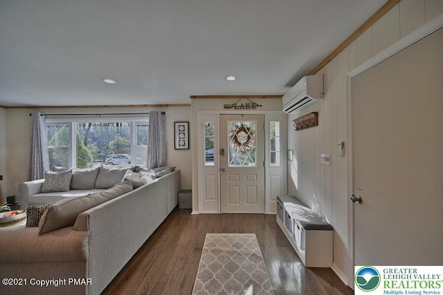 36 Maplewood Rd, Kidder Township S, PA 18624 - foyer entrance featuring a wall unit AC, dark wood-style flooring, recessed lighting, and crown molding