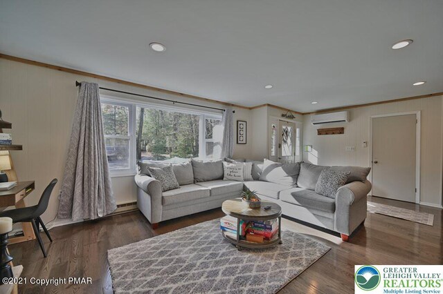 36 Maplewood Rd, Kidder Township S, PA 18624 - living area with an AC wall unit, ornamental molding, dark wood-style flooring, a baseboard radiator, and recessed lighting