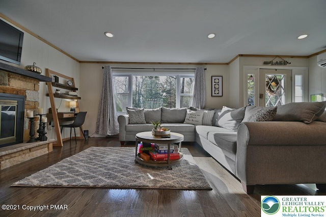36 Maplewood Rd, Kidder Township S, PA 18624 - living area featuring crown molding, a fireplace, recessed lighting, wood finished floors, and a wall mounted air conditioner