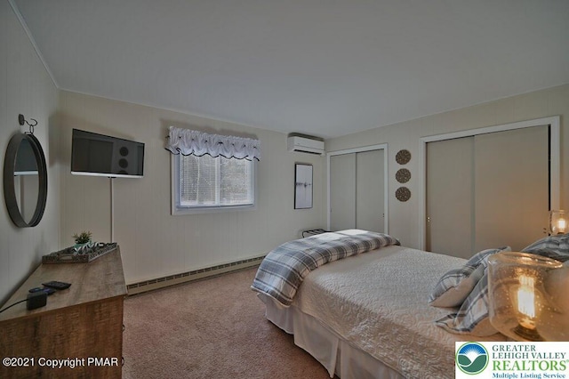 36 Maplewood Rd, Kidder Township S, PA 18624 - carpeted bedroom featuring a baseboard radiator, a wall unit AC, and two closets