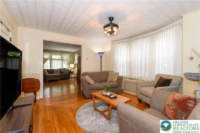 1241 Lehigh St, Allentown City, PA 18103 - living room featuring baseboards and light wood-style flooring
