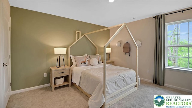 311 Knollwood Dr, Forks Twp, PA 18040 - carpeted bedroom featuring multiple windows and baseboards