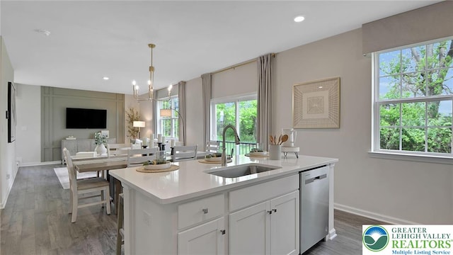 311 Knollwood Dr, Forks Twp, PA 18040 - kitchen with stainless steel dishwasher, a sink, open floor plan, plenty of natural light, and recessed lighting