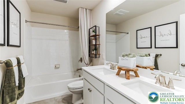 311 Knollwood Dr, Forks Twp, PA 18040 - bathroom featuring toilet, double vanity,  shower combination, and tile patterned flooring