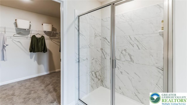 311 Knollwood Dr, Forks Twp, PA 18040 - full bath featuring a shower stall, a spacious closet, and baseboards
