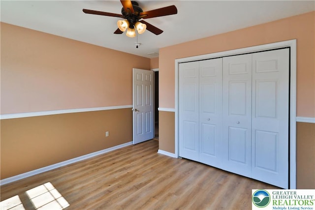 27 Willow Dr, Palmer Twp, PA 18045 - unfurnished bedroom featuring light wood-type flooring, a closet, baseboards, and a ceiling fan
