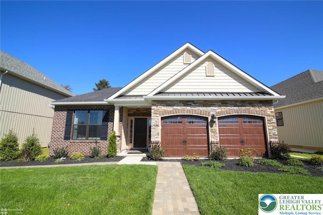 3420 Gentlewind Way Unit Ic 110, Emmaus Borough, PA 18049 - view of front facade with a garage, a front lawn, stone siding, and a standing seam roof