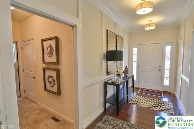 3420 Gentlewind Way Unit Ic 110, Emmaus Borough, PA 18049 - foyer with ornamental molding, baseboards, and wood finished floors