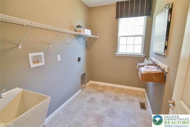 3420 Gentlewind Way Unit Ic 110, Emmaus Borough, PA 18049 - laundry room featuring washer hookup, baseboards, and hookup for an electric dryer