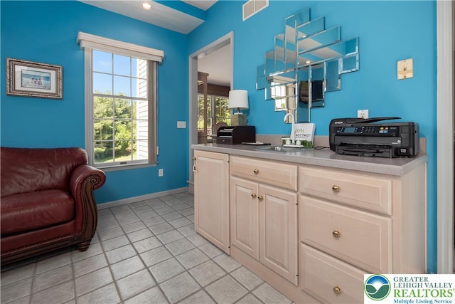 1224 Highland Dr, Upper Macungie Twp, PA 18069 - kitchen with a sink, light tile patterned floors, light countertops, and baseboards