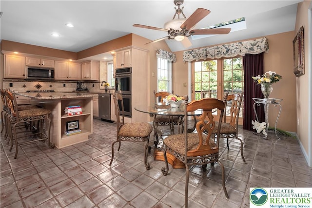 1224 Highland Dr, Upper Macungie Twp, PA 18069 - dining area featuring healthy amount of natural light, a ceiling fan, recessed lighting, a skylight, and baseboards