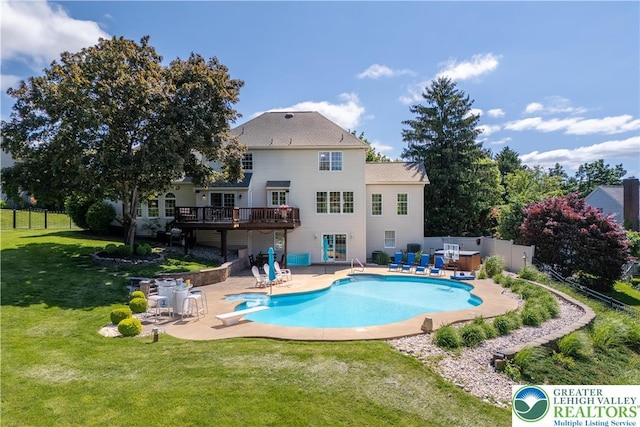 1224 Highland Dr, Upper Macungie Twp, PA 18069 - back of property with a wooden deck, a patio, and an outdoor pool