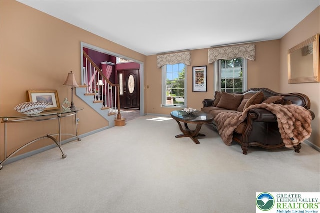 1224 Highland Dr, Upper Macungie Twp, PA 18069 - carpeted living room featuring baseboards and stairs