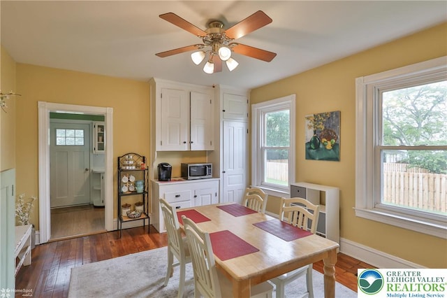 1116 Juniper St, Quakertown Boro, PA 18951 - dining area with dark wood-type flooring, a ceiling fan, and baseboards