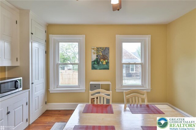 1116 Juniper St, Quakertown Boro, PA 18951 - dining room with plenty of natural light, light wood-style flooring, and baseboards