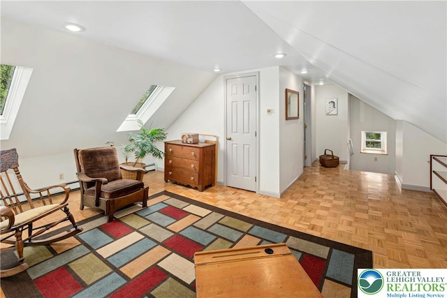 3139 Wilson Ave, Bethlehem Twp, PA 18020 - living area with a skylight, lofted ceiling, a baseboard radiator, recessed lighting, and baseboards