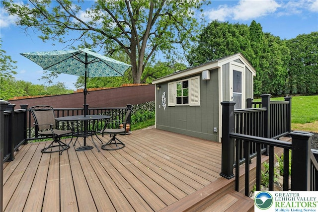 3139 Wilson Ave, Bethlehem Twp, PA 18020 - deck with outdoor dining area and an outbuilding