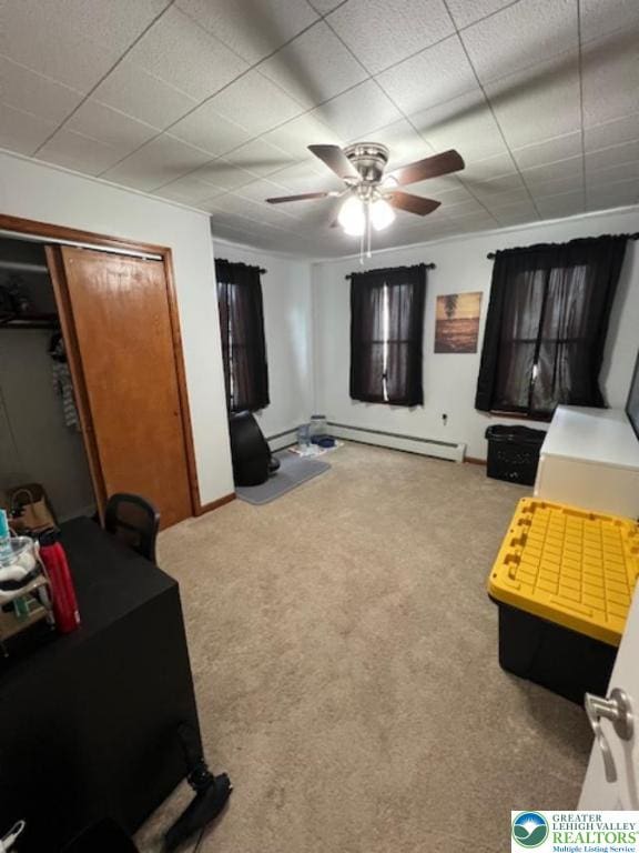 416 White St, Bowmanstown Borough, PA 18071 - living room with carpet, a baseboard radiator, ceiling fan, and a baseboard heating unit