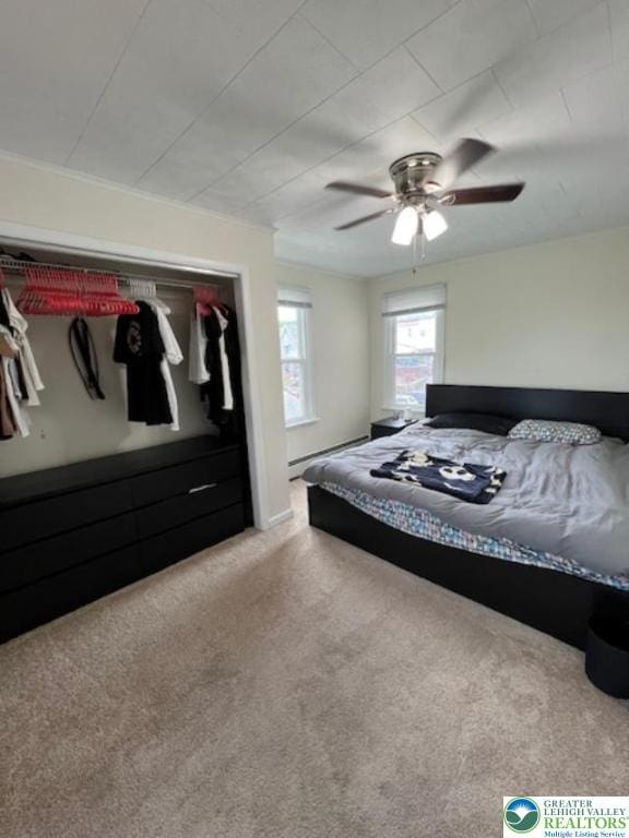 416 White St, Bowmanstown Borough, PA 18071 - carpeted bedroom featuring a baseboard heating unit and ceiling fan