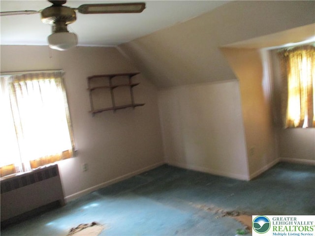 244 High St, Tatamy Borough, PA 18085 - bonus room with radiator, ceiling fan, vaulted ceiling, carpet flooring, and baseboards