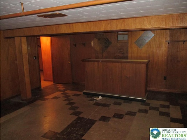 244 High St, Tatamy Borough, PA 18085 - below grade area with wooden walls and tile patterned floors