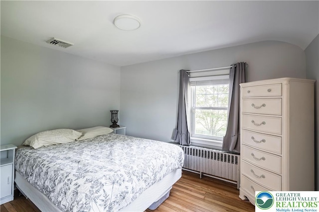 631 Main St, Tatamy Borough, PA 18085 - bedroom featuring radiator and wood finished floors