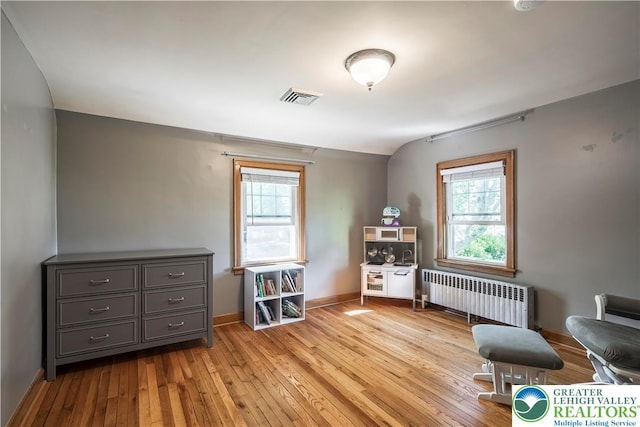 631 Main St, Tatamy Borough, PA 18085 - sitting room with radiator heating unit, light wood-style floors, and baseboards