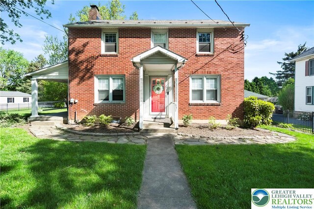 631 Main St, Tatamy Borough, PA 18085 - view of front of property with brick siding and a chimney