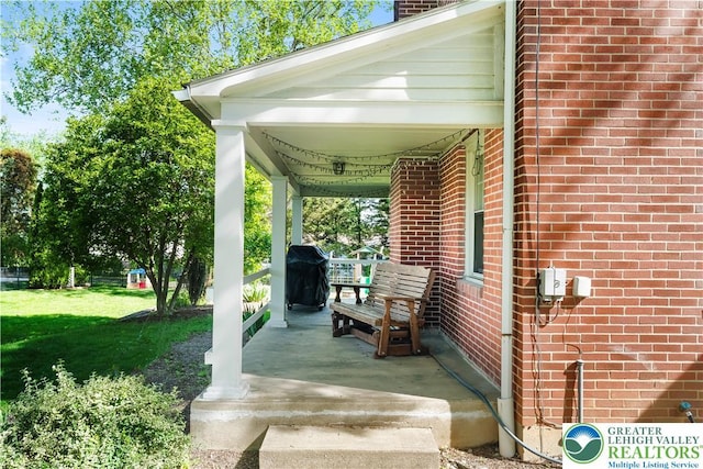 631 Main St, Tatamy Borough, PA 18085 - covered porch featuring area for grilling